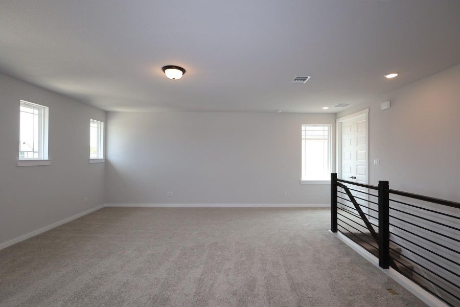 Spacious, unfurnished interior of a new home in Homestead at Old Settlers Park, Round Rock (Image 13).