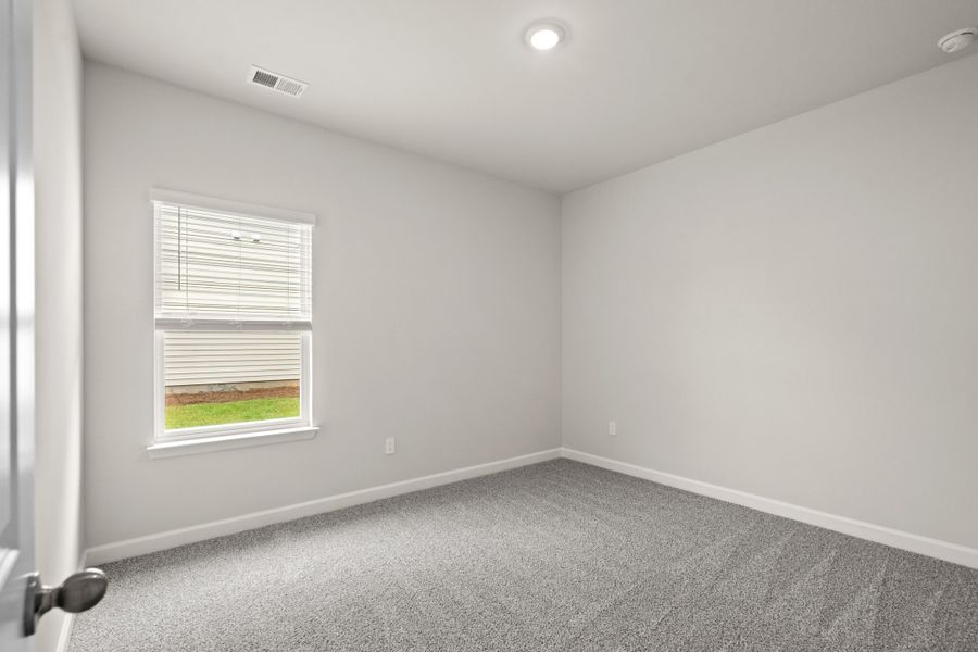 Spacious, unfurnished interior of a new home in Cypress Ridge - The Coastline Series, Longs (Image 27).