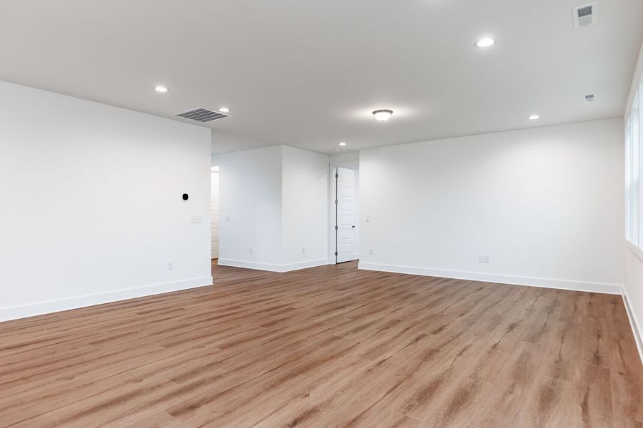 Spacious, unfurnished interior of a new home in High Grove Oaks, Fuquay Varina (Image 42).