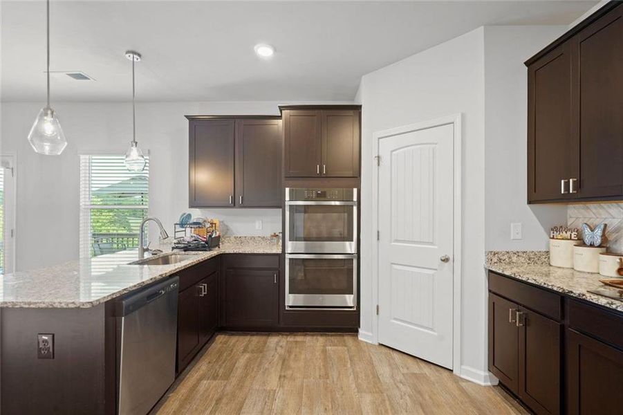 Furnished interior view inside a new home in The Enclave at Dial Farm Phase III, Walnut Grove (Image 16).