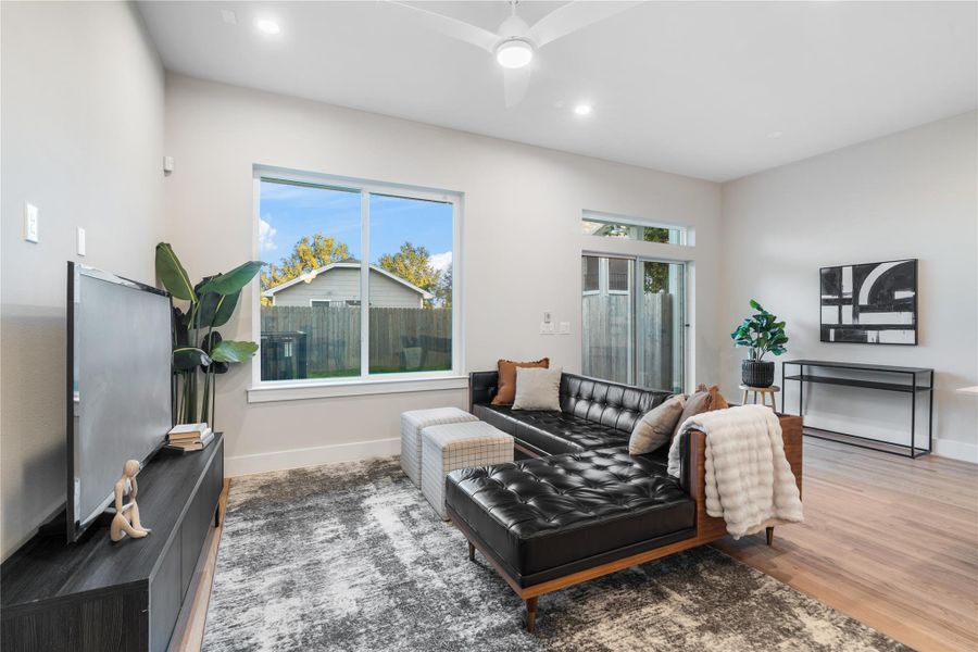 The expansive living room offers plenty of space for a large sectional, perfect for gathering with family or enjoying a relaxing movie night in. The expansive living room offers plenty of space for a large sectional, perfect for gathering with family or enjoying a relaxing movie night in.