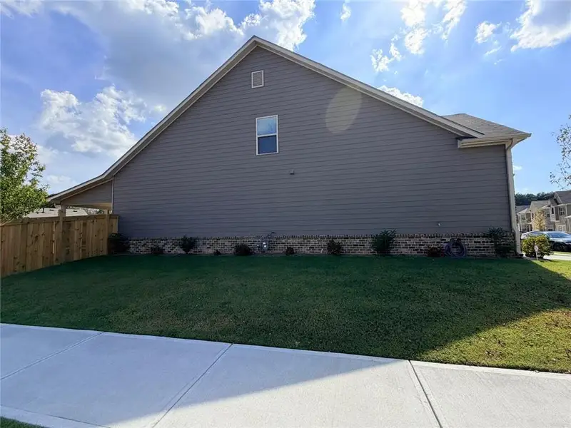 Exterior details and patio area of a home in , Loganville (Image 20).