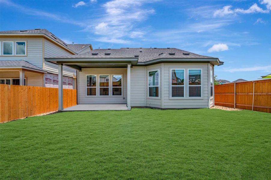 Exterior details and patio area of a home in Cedar Brook, Leander (Image 13).