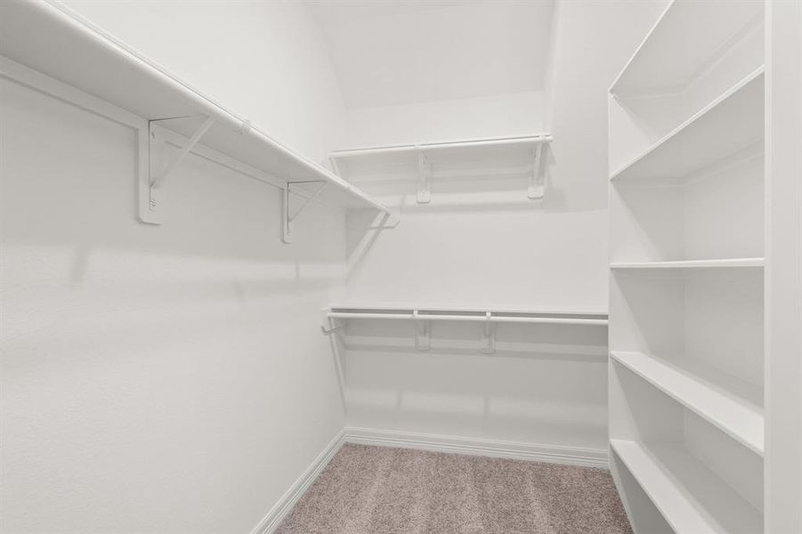 A view of your large primary walk-in Closet