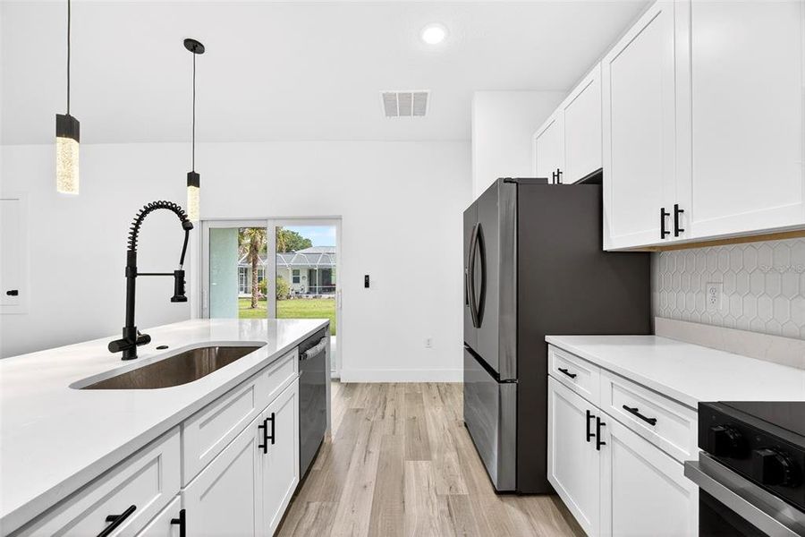 Furnished interior view inside a new home in , North Port (Image 11).