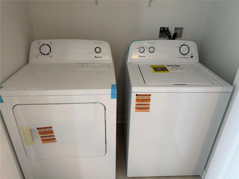 Full-size washer and dryer included for everyday comfort and practicality.