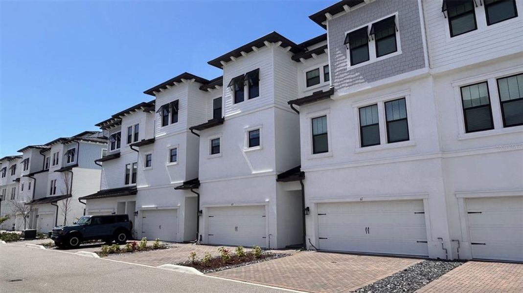 Front exterior of a new home in , Tampa, FL, highlighting curb appeal (Image 2). Front exterior of a new home in , Tampa, FL, highlighting curb appeal (Image 2).