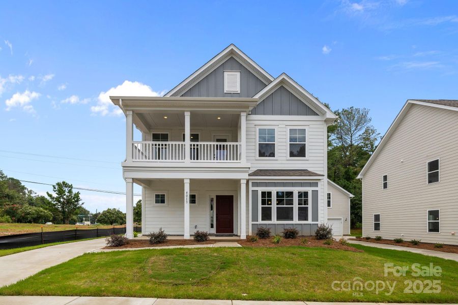 2 story front porch. Detached 2 car garage with finished bonus above. Includes a full bath, wet bar and walk in storage. 2 story front porch. Detached 2 car garage with finished bonus above. Includes a full bath, wet bar and walk in storage.