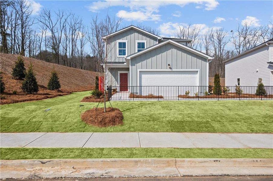 Front exterior of a new home in Avery Ridge, Gainesville, GA, highlighting curb appeal (Image 2).
