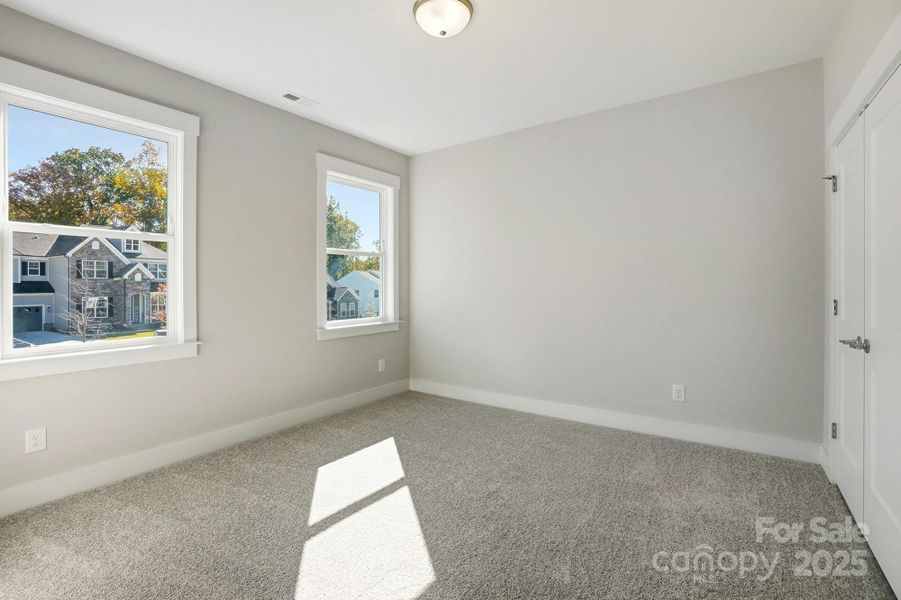 Spacious, unfurnished interior of a new home in Rone Creek, Waxhaw (Image 24).