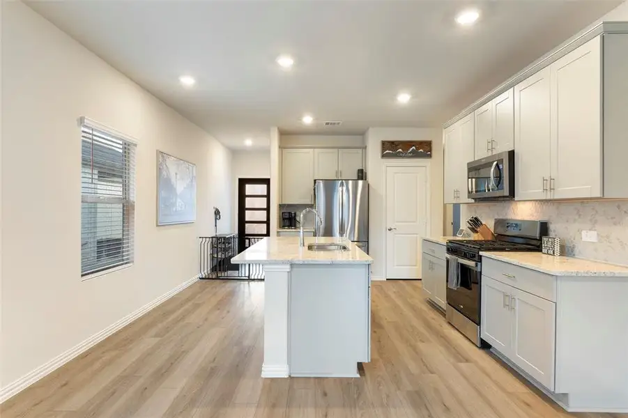 Furnished interior view inside a new home in Lakehaven - Spring Series, Farmersville (Image 10).