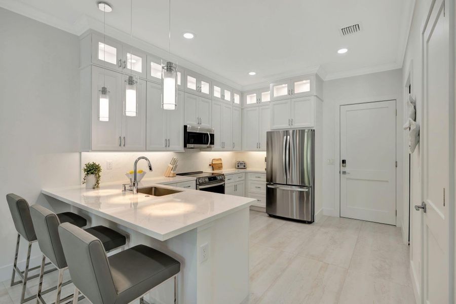 Furnished interior view inside a new home in , Stuart (Image 10).