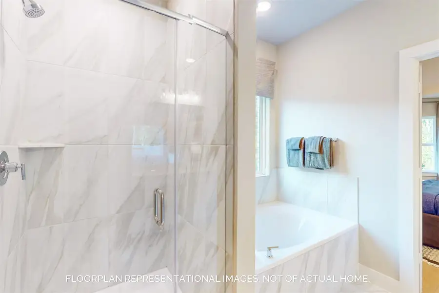 Furnished interior view inside a new home in Pinewood at Grand Texas, New Caney (Image 9).