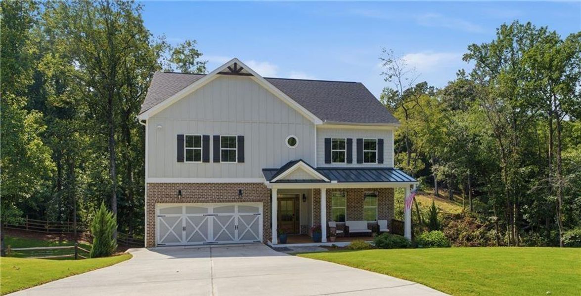 Front exterior of a new home in , Cumming, GA, highlighting curb appeal (Image 20).
