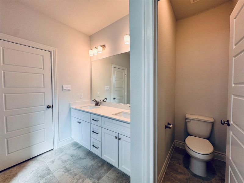 Furnished interior view inside a new home in Lexington Heights, Willis (Image 9).