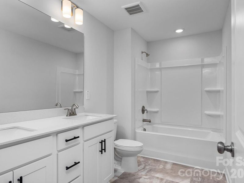 Furnished interior view inside a new home in Enclave at Belmont, Belmont (Image 13). Furnished interior view inside a new home in Enclave at Belmont, Belmont (Image 13).