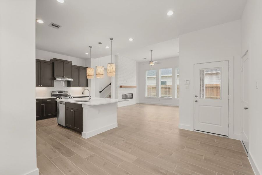 Representative furnished interior of a home built from the St Andrews by Chesmar Homes in Riceland Alley Loads, Mont Belvieu (Image 18).