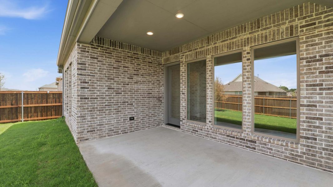 Exterior details and patio area of a home in Trinity Falls, McKinney (Image 4).