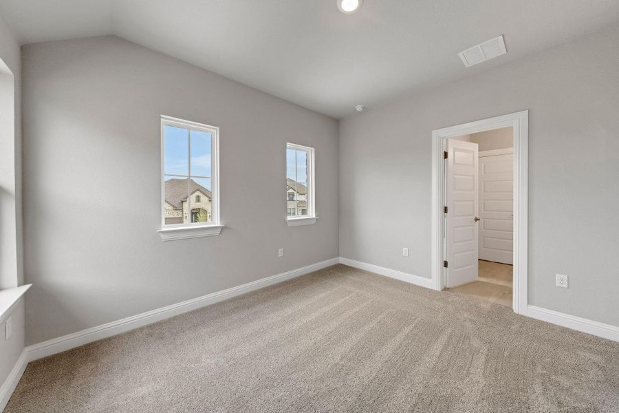 Unfurnished bedroom featuring carpet floors and baseboards Unfurnished bedroom featuring carpet floors and baseboards