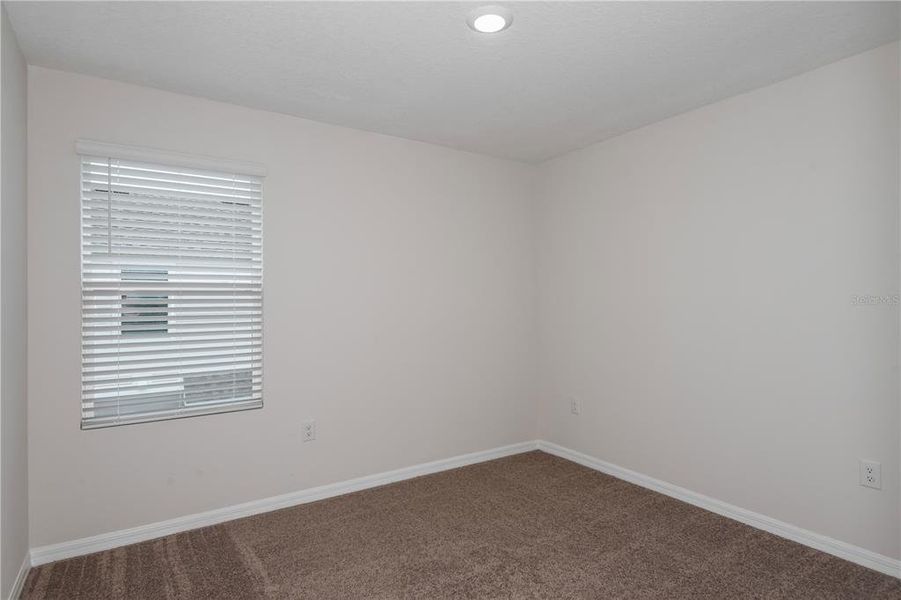 Spacious, unfurnished interior of a new home in Pasadena Woods, Dade City (Image 16).