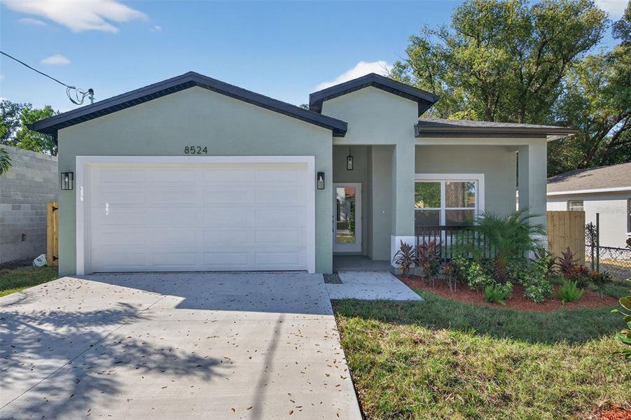 Front exterior of a new home in , Tampa, FL, highlighting curb appeal (Image 30). Front exterior of a new home in , Tampa, FL, highlighting curb appeal (Image 30).