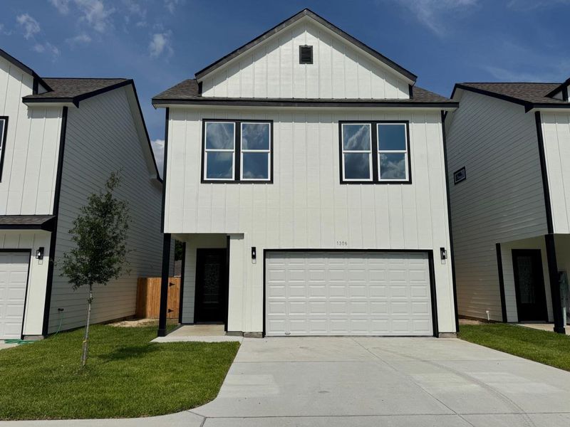 Front exterior of a new home in , Houston, TX, highlighting curb appeal (Image 21).