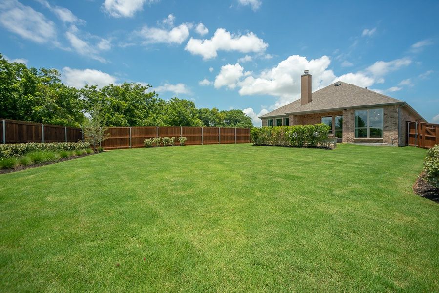 Front exterior of a new home in Wildridge, Oak Point, TX, highlighting curb appeal (Image 24).