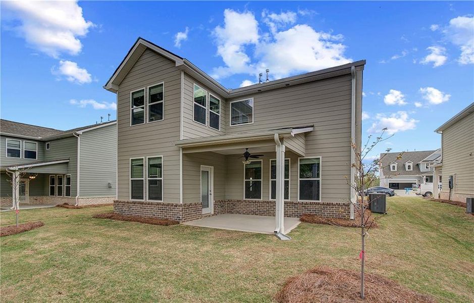 Front exterior of a new home in Cooper Park, McDonough, GA, highlighting curb appeal (Image 2).