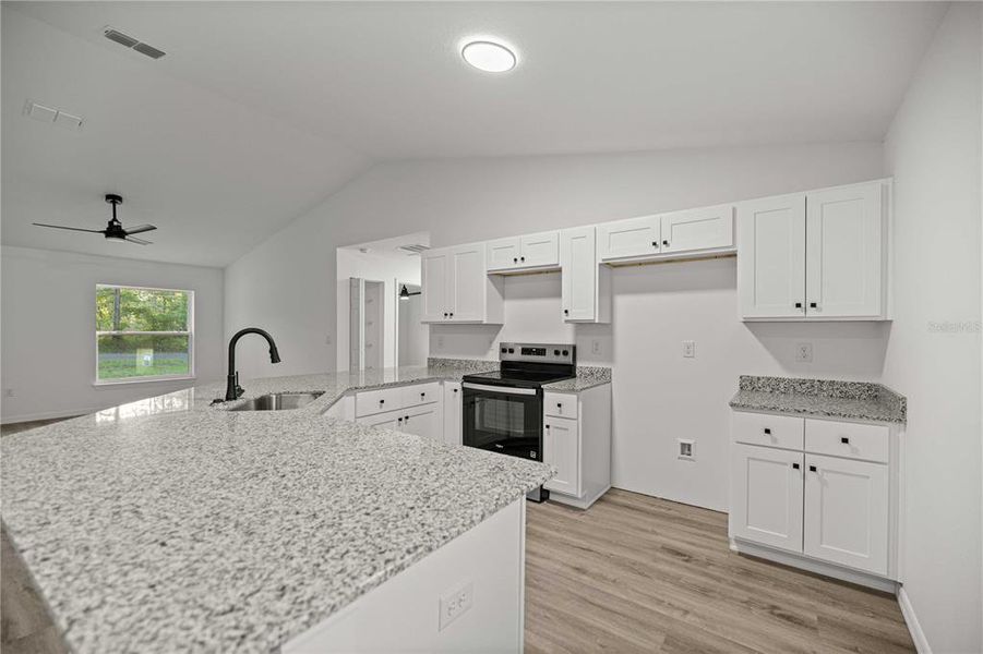 Furnished interior view inside a new home in , Dunnellon (Image 8).