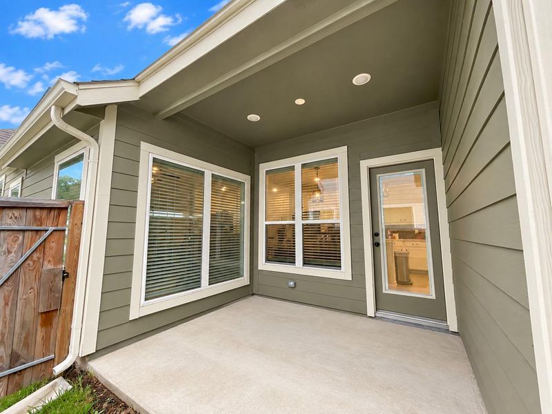 Exterior details and patio area of a home in Woodforest, Montgomery (Image 4).