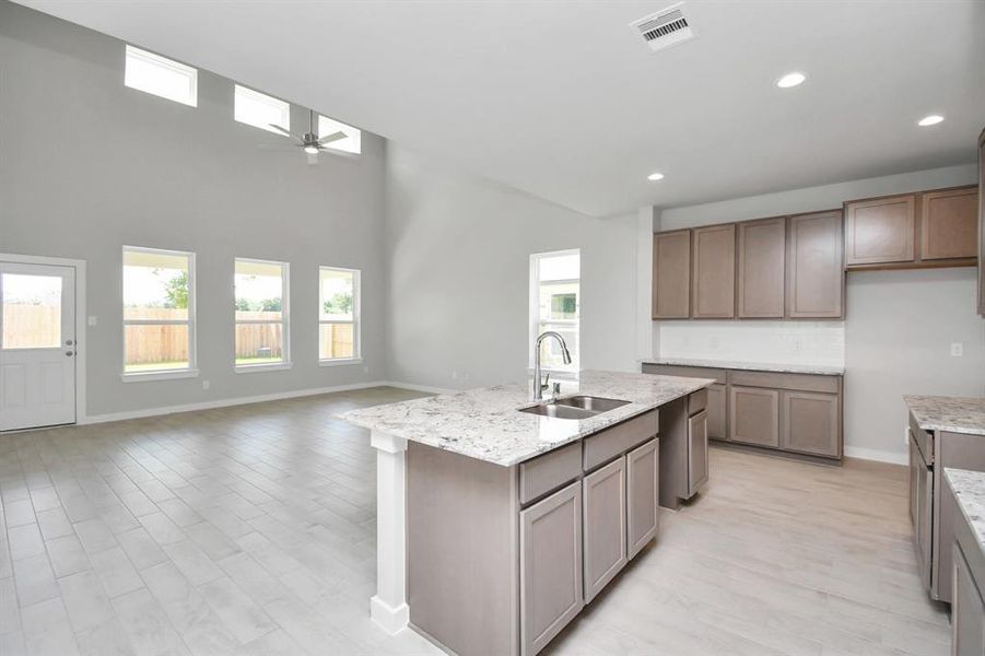 This generously spacious kitchen is a dream realized! Sample photo of completed home. Actual colors and selections may vary.