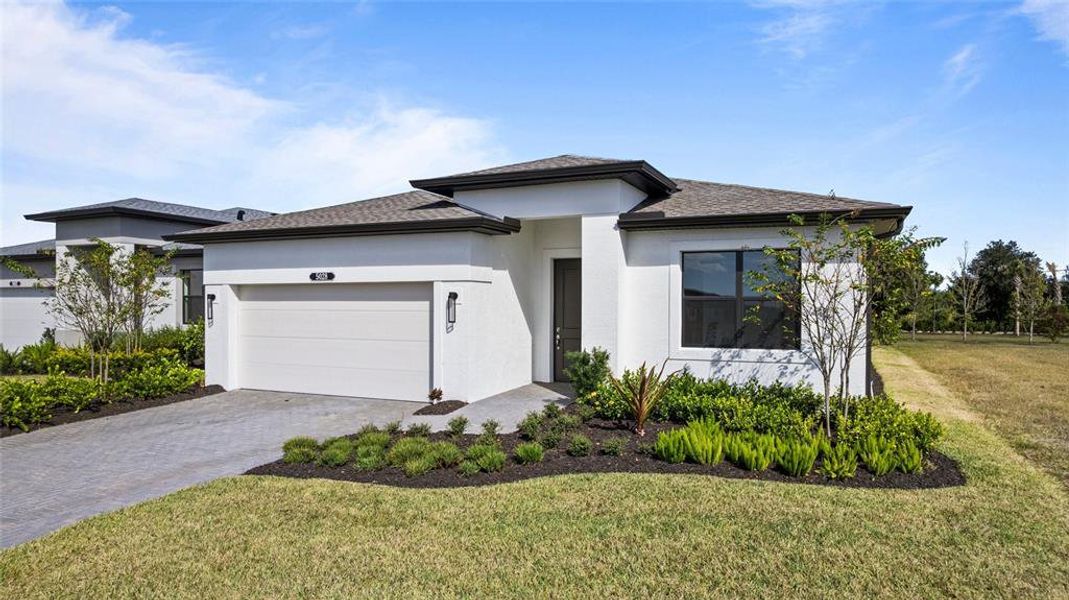 Front exterior of a new home in Woodland Preserve, Parrish, FL, highlighting curb appeal (Image 19). Front exterior of a new home in Woodland Preserve, Parrish, FL, highlighting curb appeal (Image 19).