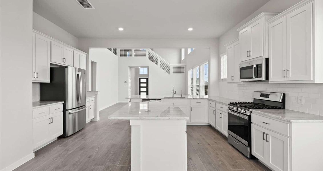 Furnished interior view inside a new home in Village at Three Oaks, Seguin (Image 4). Furnished interior view inside a new home in Village at Three Oaks, Seguin (Image 4).