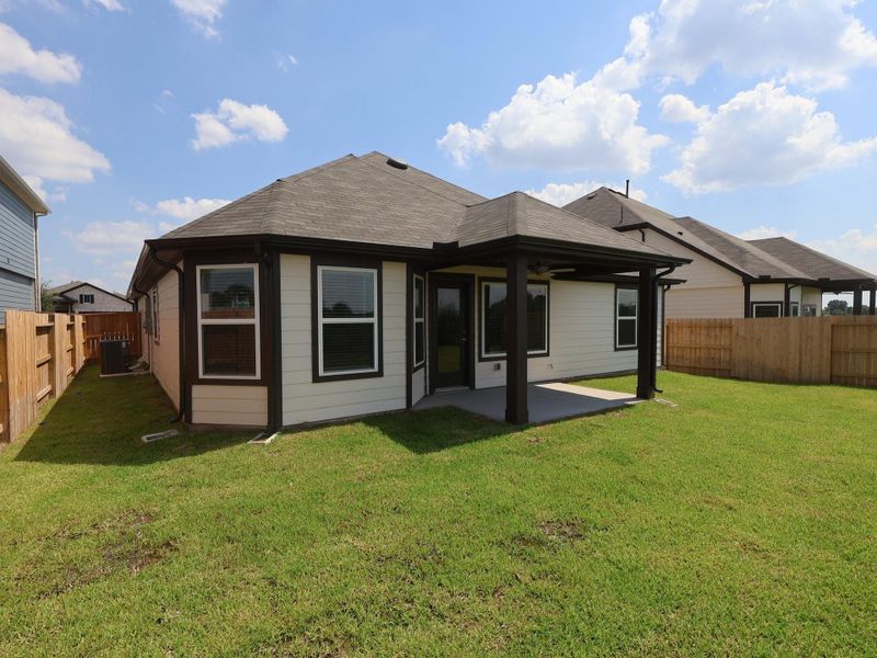 Front exterior of a new home in Summerview, Fulshear, TX, highlighting curb appeal (Image 16). Front exterior of a new home in Summerview, Fulshear, TX, highlighting curb appeal (Image 16).