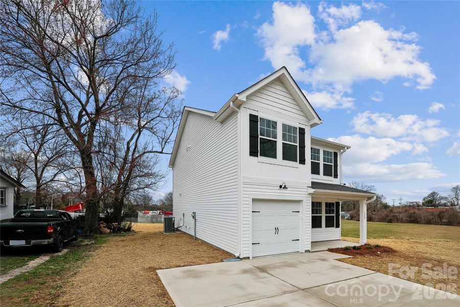 Front exterior of a new home in , Statesville, NC, highlighting curb appeal (Image 2). Front exterior of a new home in , Statesville, NC, highlighting curb appeal (Image 2).