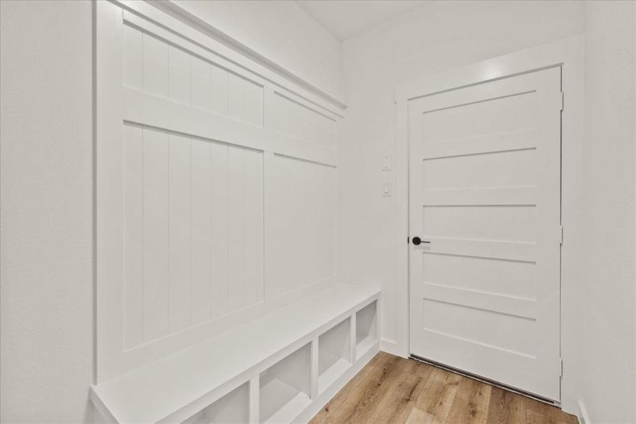 Mudroom featuring light hardwood / wood-style flooring