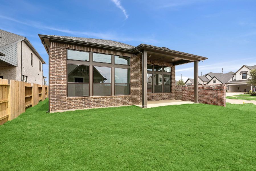 Front exterior of a new home in Grange 45' Homesites, Katy, TX, highlighting curb appeal (Image 22).