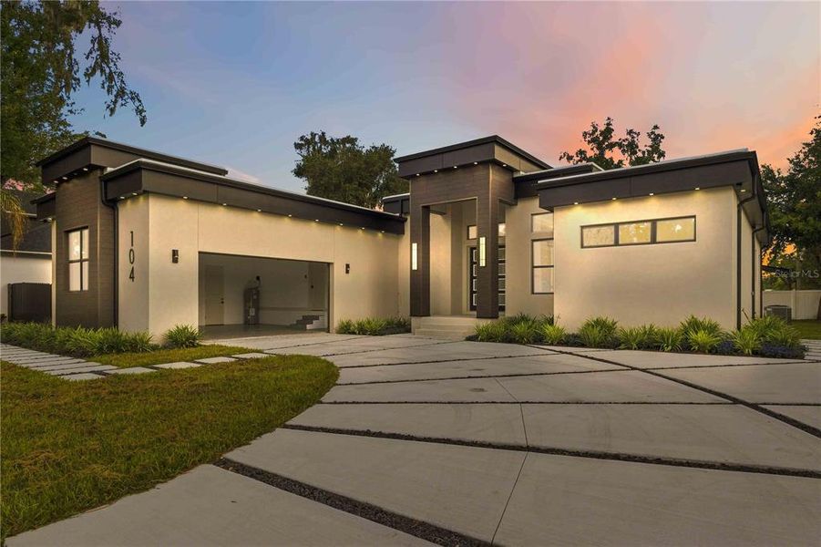 Front exterior of a new home in , Plant City, FL, highlighting curb appeal (Image 2).