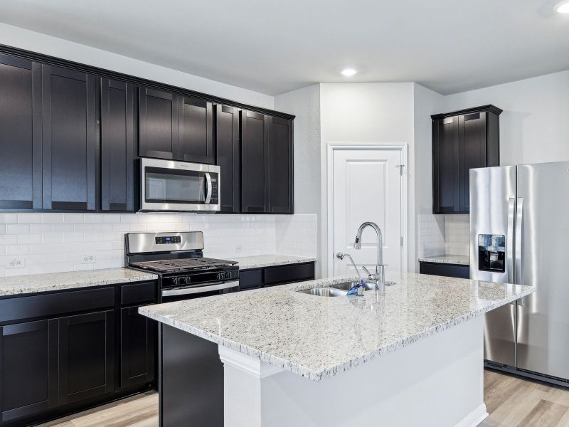 Furnished interior view inside a new home in Flora, Hutto (Image 3).