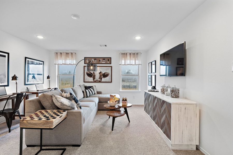 A living room with a couch and a coffee table.