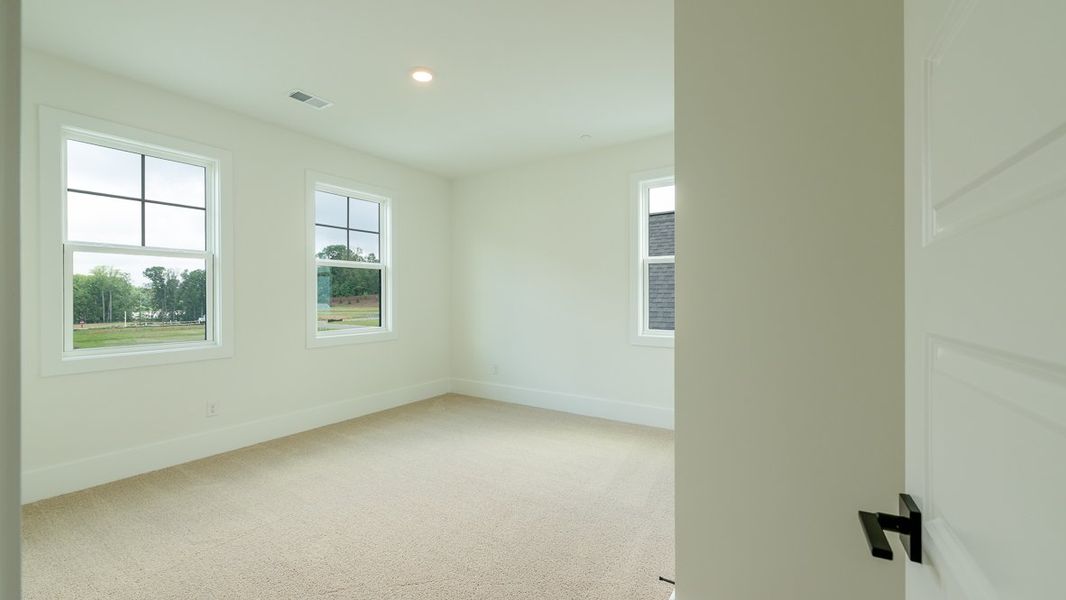 Representative unfurnished interior of a home built from the Hanover by D.R. Horton in The Village at Sandy Plains, Marietta (Image 34).