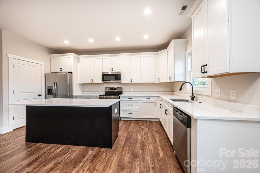 Furnished interior view inside a new home in , Lenoir (Image 6).
