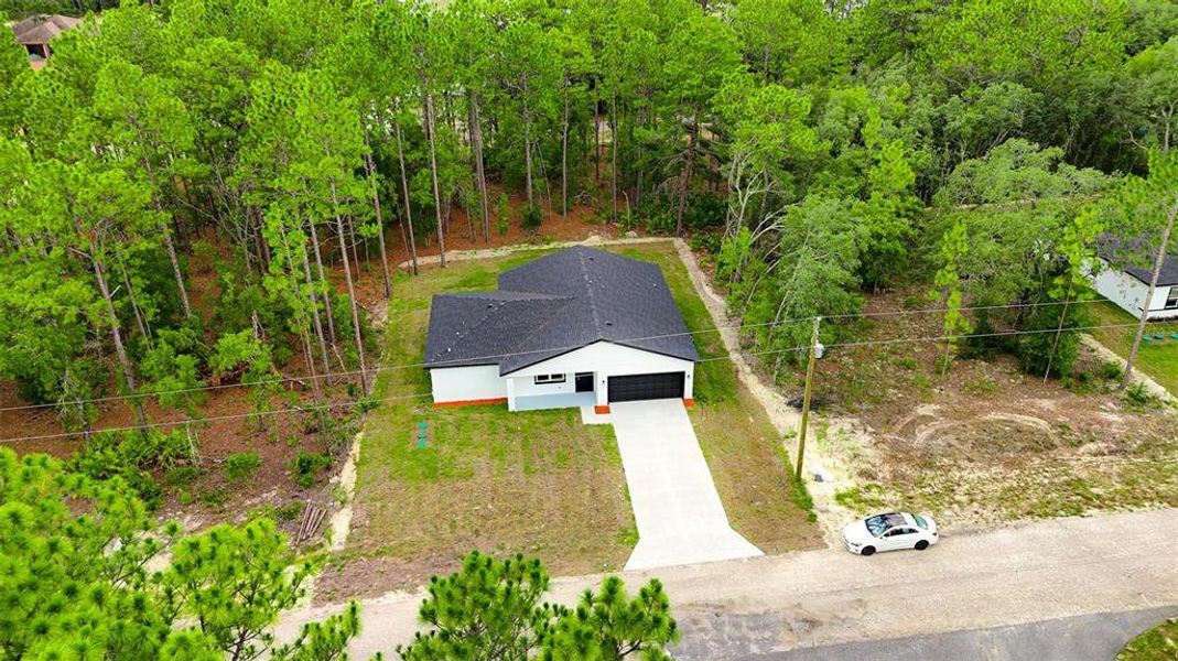 Front exterior of a new home in , Citrus Springs, FL, highlighting curb appeal (Image 23). Front exterior of a new home in , Citrus Springs, FL, highlighting curb appeal (Image 23).