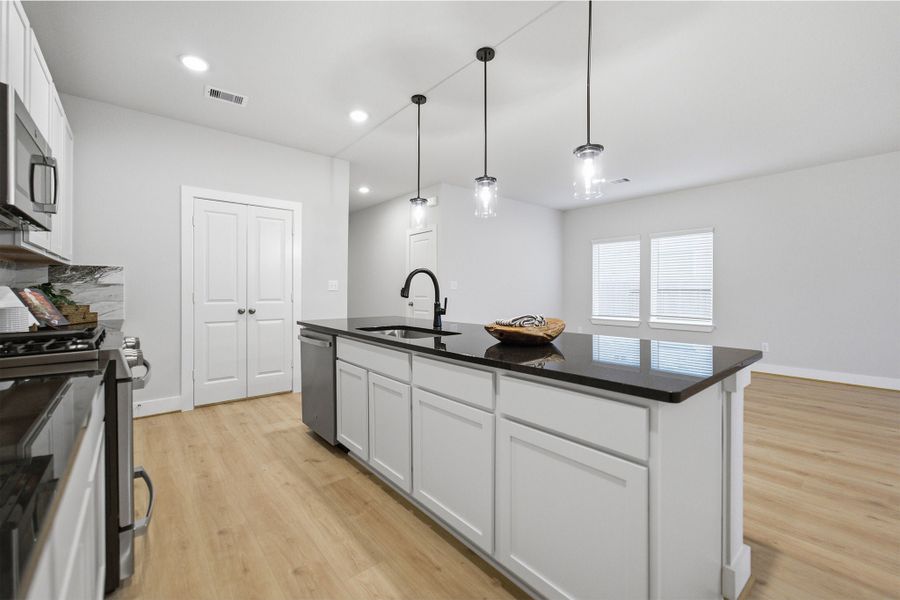 Furnished interior view inside a new home in Massey Oaks, Pearland (Image 7).