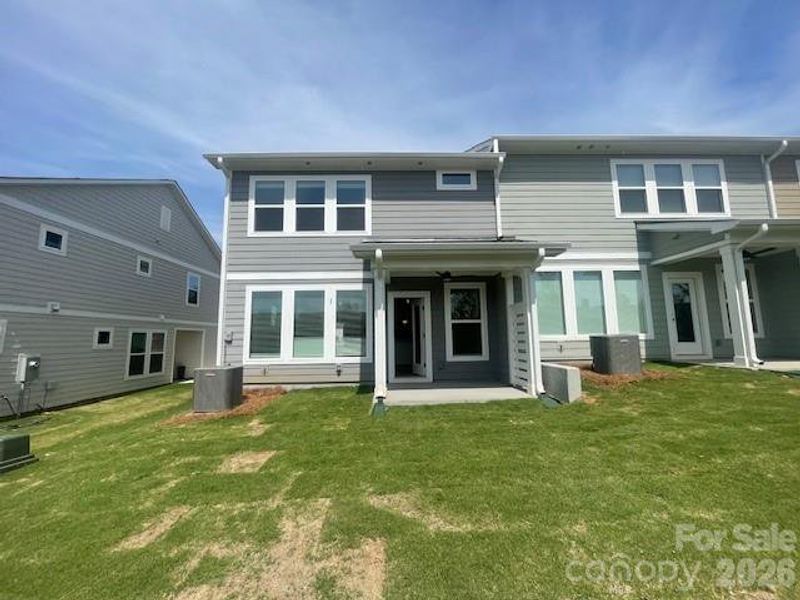 Exterior details and patio area of a home in Westview Towns, Waxhaw (Image 4). Exterior details and patio area of a home in Westview Towns, Waxhaw (Image 4).
