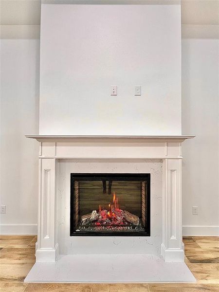 Close-up view of the Electric Fireplace in the Living room ready with an Electrical Outlet ready for a Smart TV up to 80" and a Pre Set-up for Ethernet/Cables.