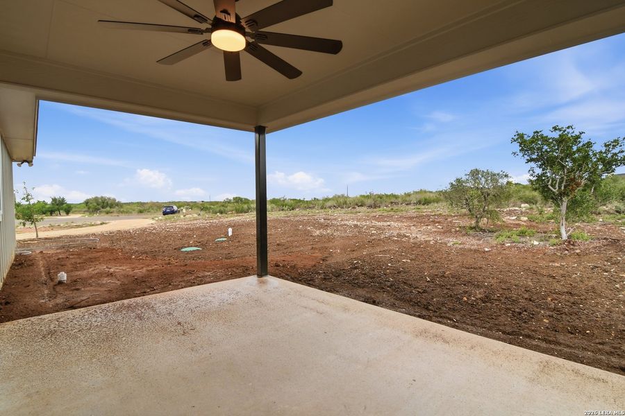 Exterior details and patio area of a home in , Uvalde (Image 20).