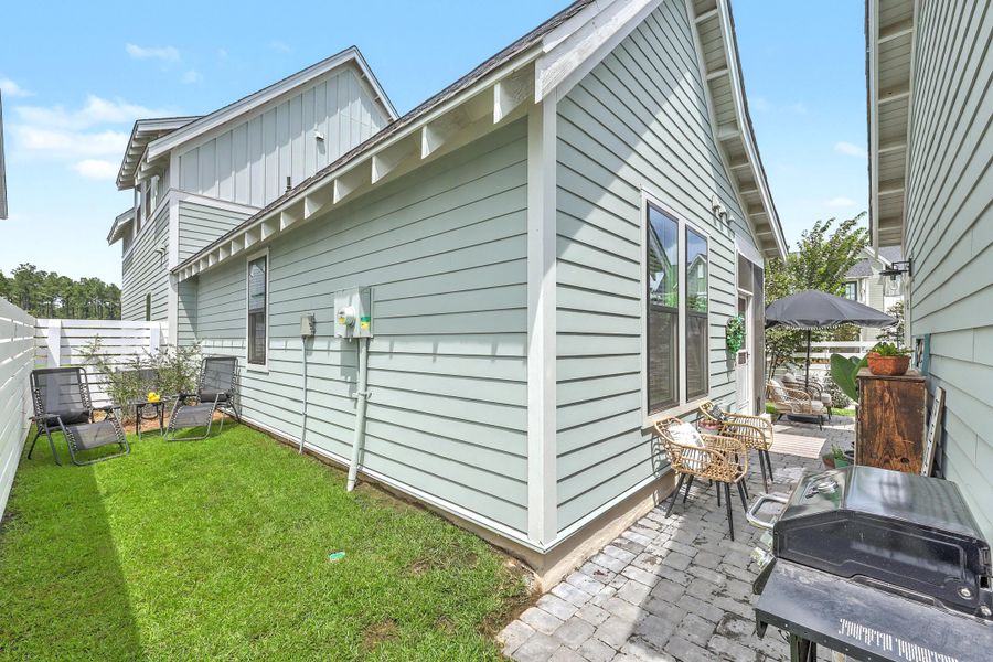Exterior details and patio area of a home in Nexton - Midtown, Summerville (Image 4). Exterior details and patio area of a home in Nexton - Midtown, Summerville (Image 4).