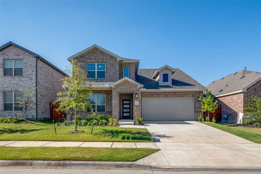Front exterior of a new home in Heartland, Heartland, TX, highlighting curb appeal (Image 2). Front exterior of a new home in Heartland, Heartland, TX, highlighting curb appeal (Image 2).