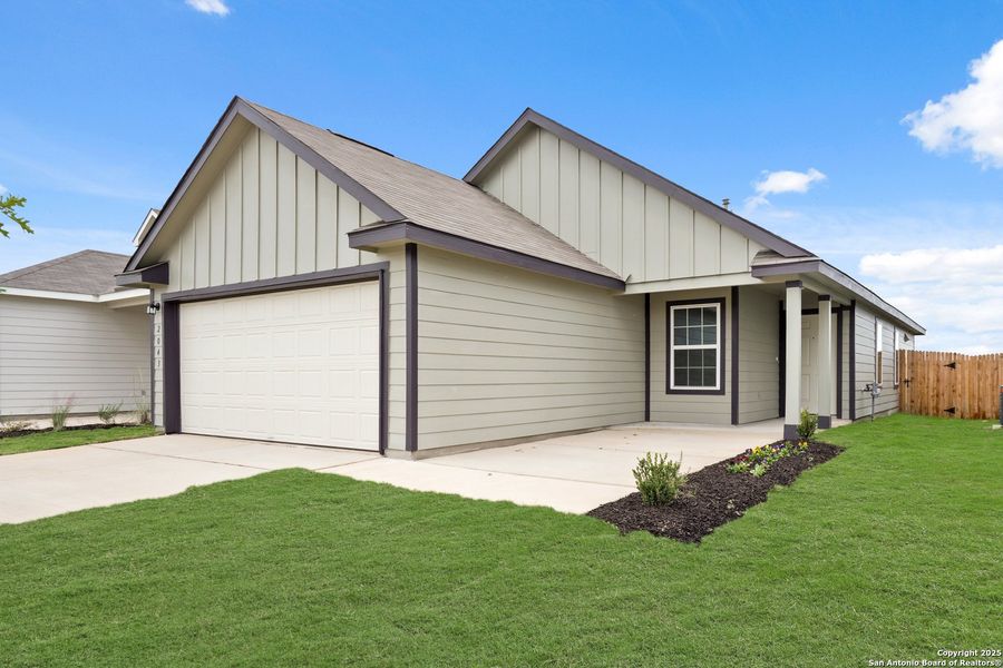 Front exterior of a new home in Dauer Ranch, New Braunfels, TX, highlighting curb appeal (Image 1). Front exterior of a new home in Dauer Ranch, New Braunfels, TX, highlighting curb appeal (Image 1).